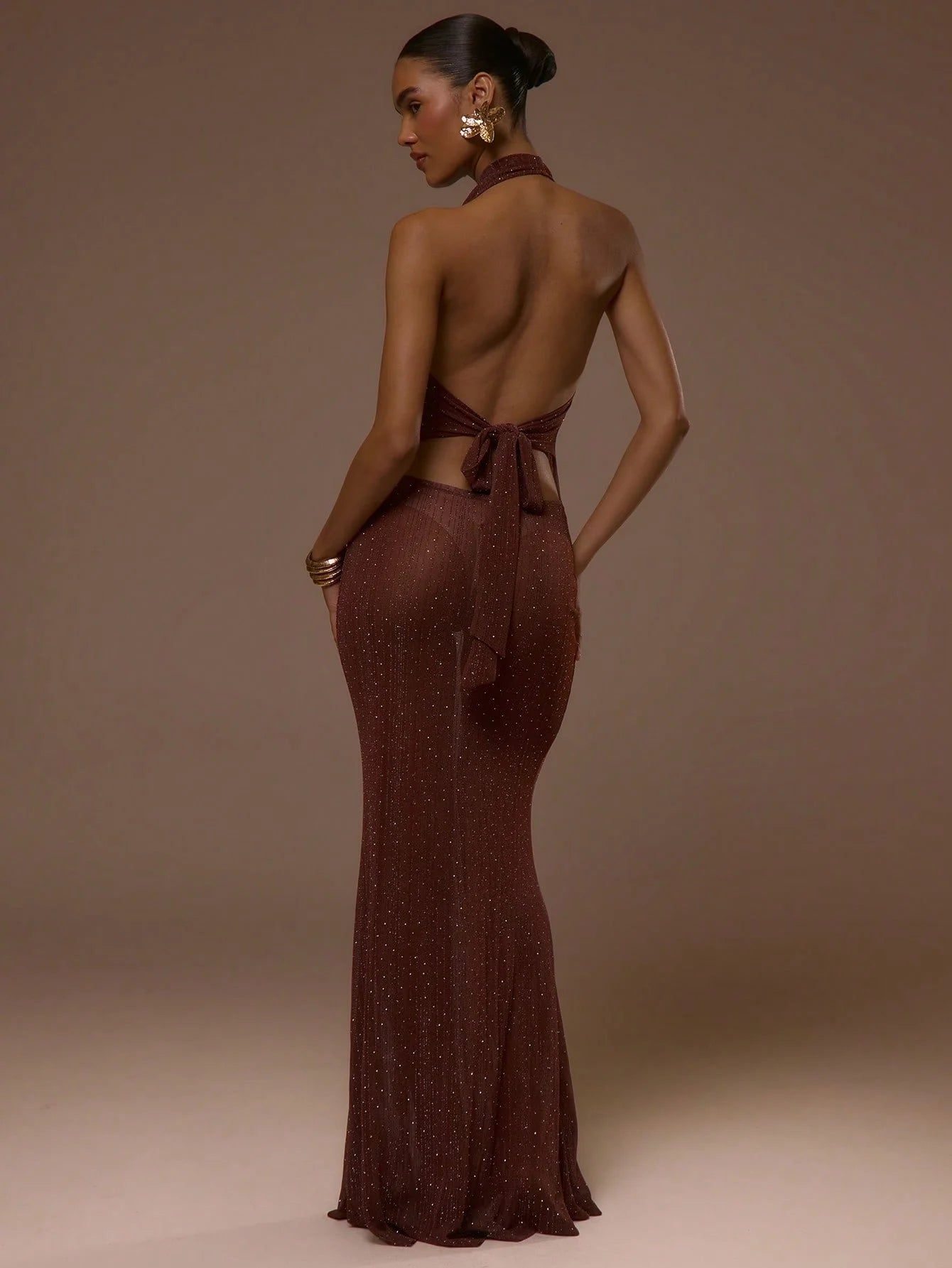 Deep V-neck low-waist bow tie glittering floor-length knitted dress. Sexy evening gown for summer and spring, elegant bow tie.