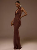 Deep V-neck low-waist bow tie glittering floor-length knitted dress. Sexy evening gown for summer and spring, elegant bow tie.
